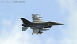 A Danish F-16 Fighting Falcon jet fighter flies over the Sigonella NATO Airbase in the southern Italian island of Sicily