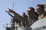 Iran’s Navy commander Habibollah Sayyari points while standing on a naval ship during Velayat-90 war game on Sea of Oman near the Strait of Hormuz in southern Iran