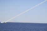 New medium-range missile is fired from naval ship during Velayat-90 war game on Sea of Oman near Strait of Hormuz in southern Iran